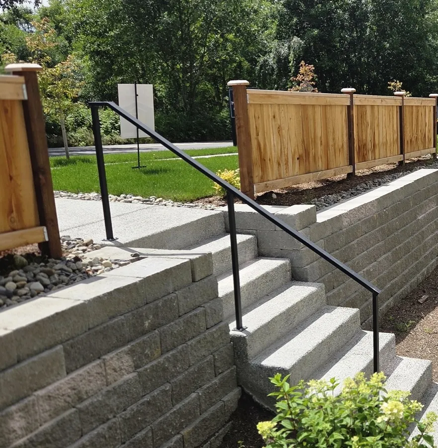 Wall-mounted metal handrail